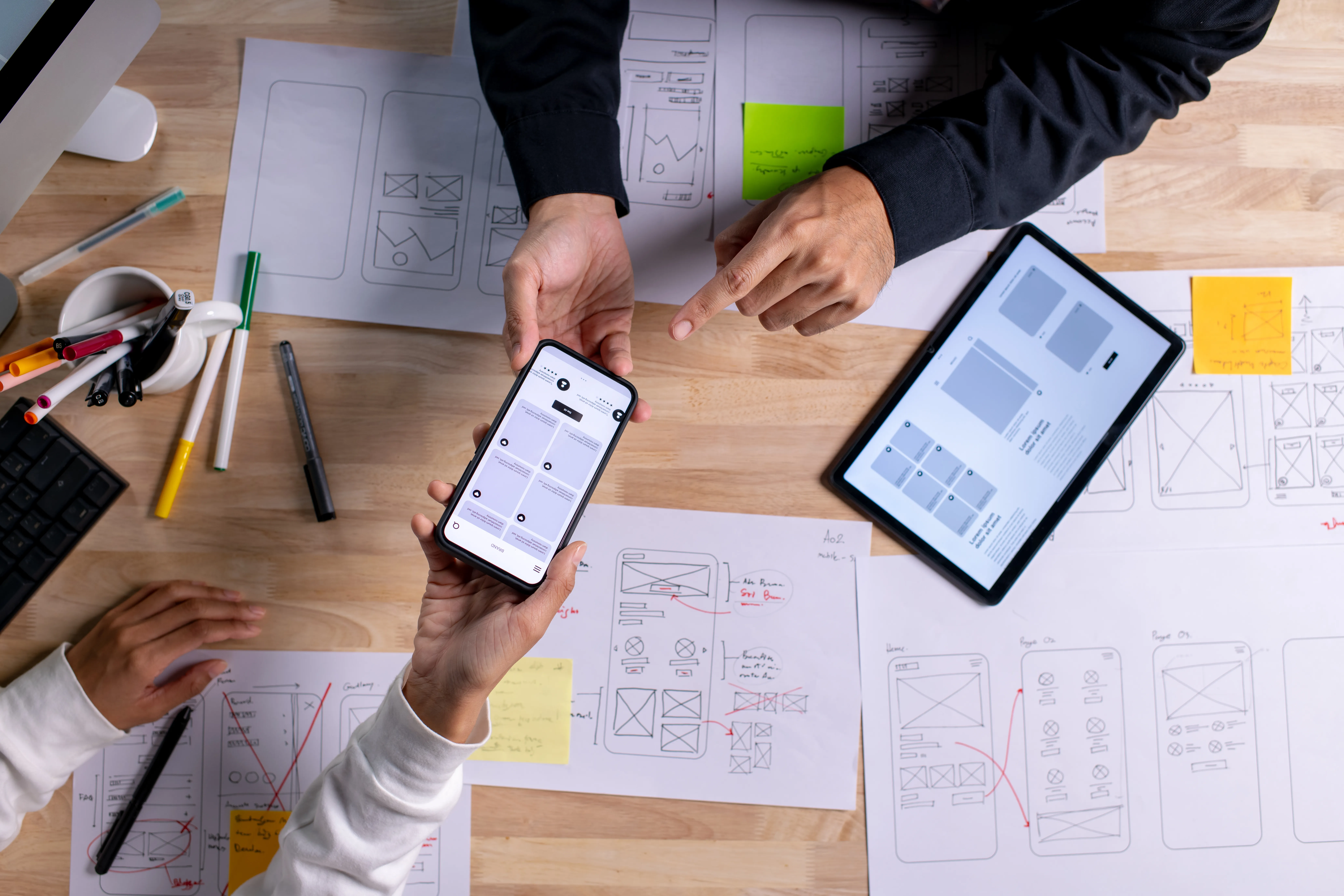 Drawing of the wireframe of a new website being discussed